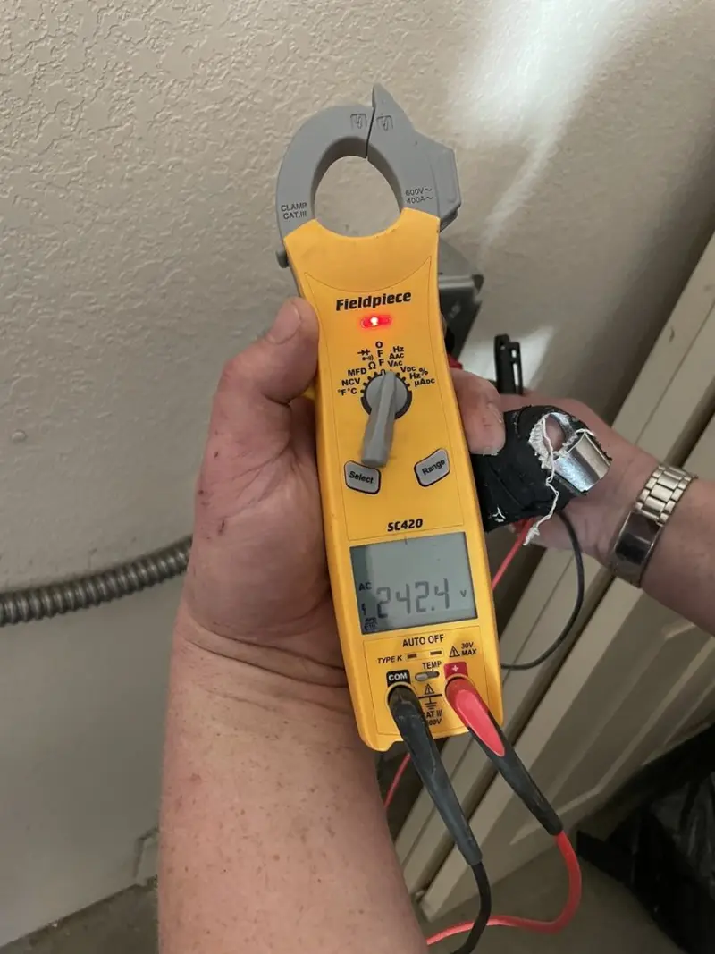 Voltage testing with clamp meter during Electrical Installation Services in Crystal River